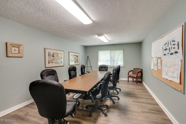 1012 Bunker Dr Unit 307, Akron, OH 44333 - office space with wood finished floors and a textured ceiling