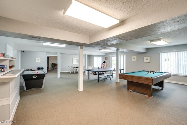 1012 Bunker Dr Unit 307, Akron, OH 44333 - recreation room featuring pool table, a textured ceiling, healthy amount of natural light, and light carpet