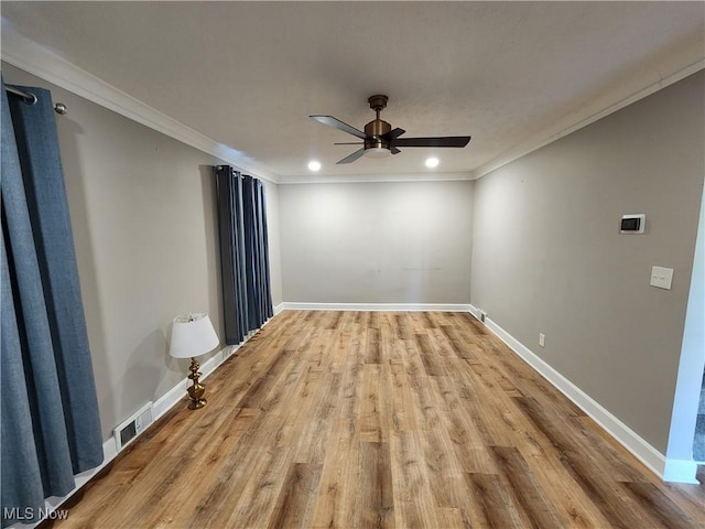 343 Genesee Ave NE, Warren, OH 44483 - empty room with light wood finished floors, a ceiling fan, crown molding, and recessed lighting