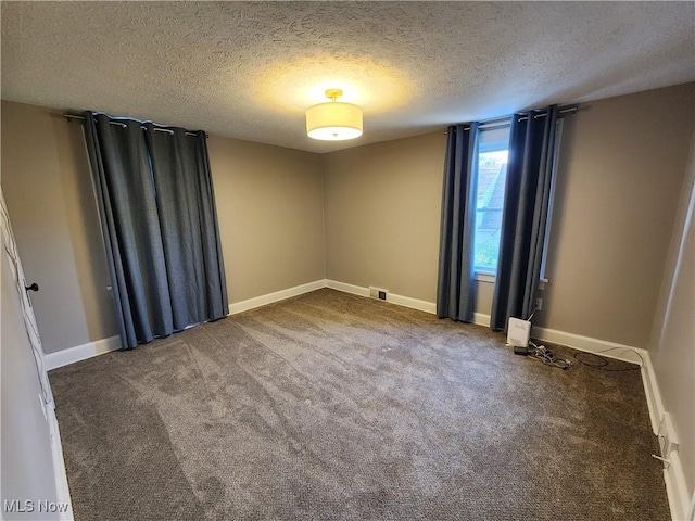 343 Genesee Ave NE, Warren, OH 44483 - unfurnished room featuring a textured ceiling and carpet floors