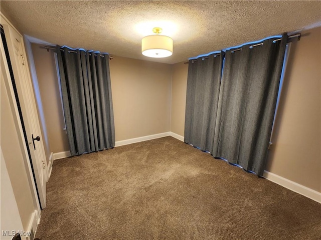343 Genesee Ave NE, Warren, OH 44483 - unfurnished room with a textured ceiling and carpet floors