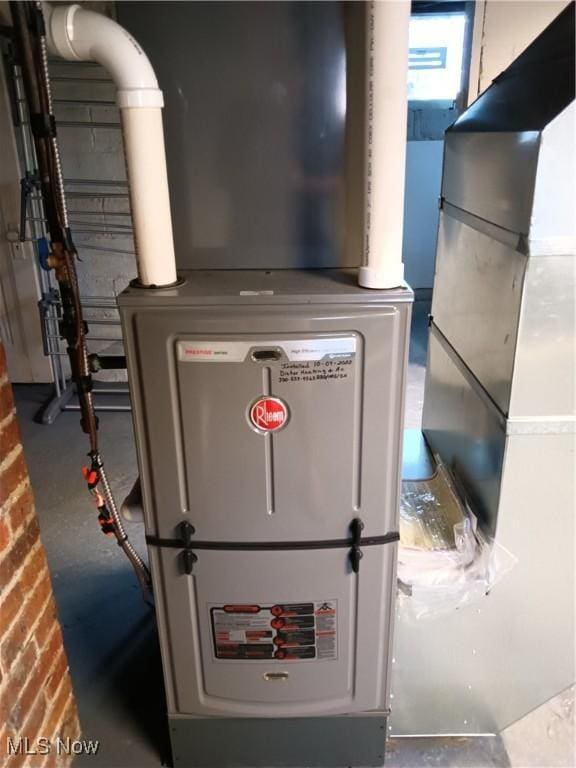 343 Genesee Ave NE, Warren, OH 44483 - utility room with heating unit