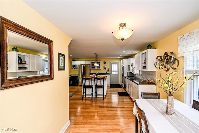 4219 3rd St NW, Canton, OH 44708 - dining room with light wood-type flooring and recessed lighting