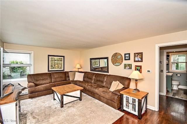 4219 3rd St NW, Canton, OH 44708 - living area featuring dark wood finished floors and baseboards