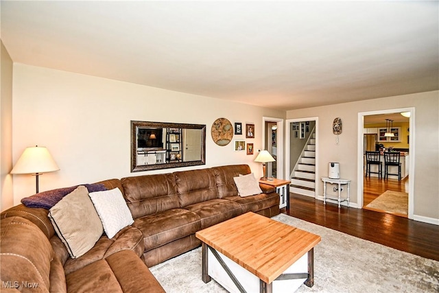 4219 3rd St NW, Canton, OH 44708 - living room featuring stairs and wood finished floors