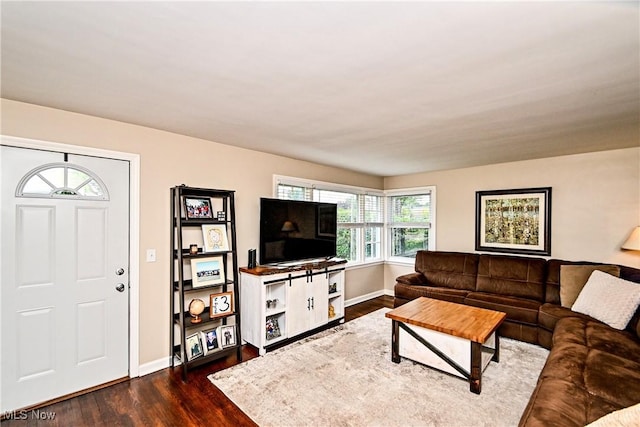 4219 3rd St NW, Canton, OH 44708 - living room with dark wood-style flooring and baseboards