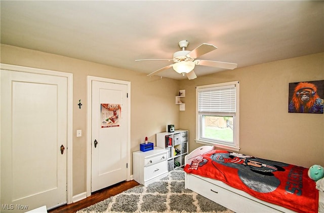 4219 3rd St NW, Canton, OH 44708 - bedroom with dark wood-style floors and ceiling fan