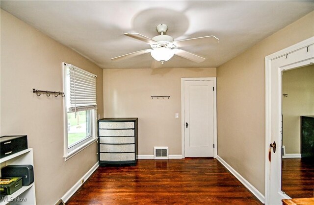 4219 3rd St NW, Canton, OH 44708 - unfurnished room featuring wood finished floors and a ceiling fan