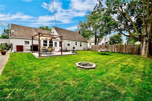 4219 3rd St NW, Canton, OH 44708 - rear view of house featuring a pergola, a fenced backyard, and a patio area