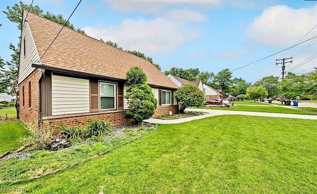 4611 W 158th St, Cleveland, OH 44135 - view of front of house with brick siding and roof with shingles
