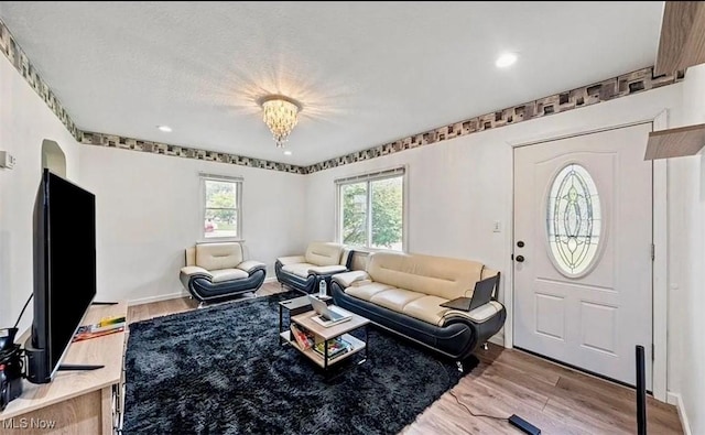 4611 W 158th St, Cleveland, OH 44135 - living area featuring light wood-style floors, recessed lighting, and a chandelier