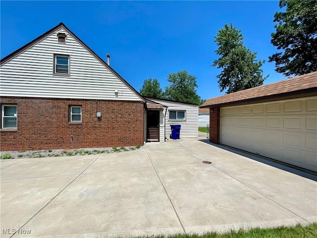 4611 W 158th St, Cleveland, OH 44135 - view of property exterior featuring brick siding