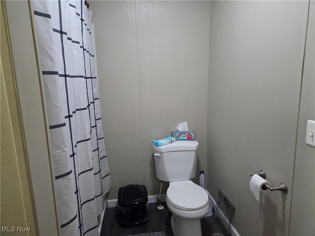 10039 State Route 700, Mantua, OH 44255 - bathroom with toilet and curtained shower