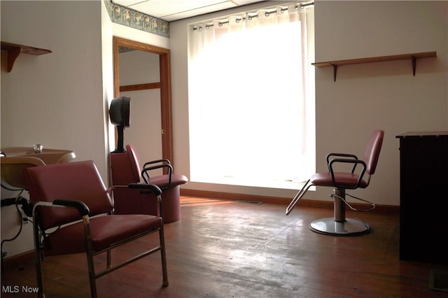 208 2nd St SW, Carrollton, OH 44615 - living area featuring wood finished floors and healthy amount of natural light