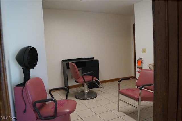 208 2nd St SW, Carrollton, OH 44615 - living area featuring baseboards and light tile patterned flooring