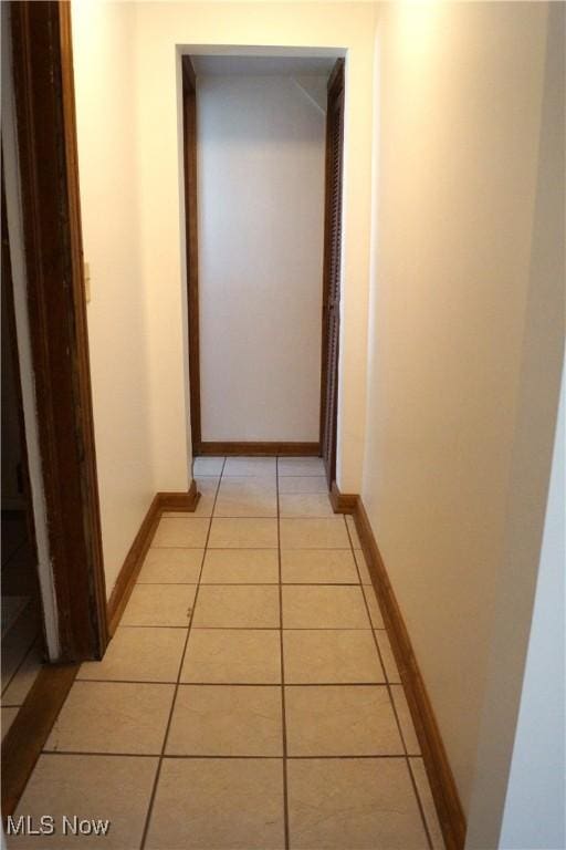 208 2nd St SW, Carrollton, OH 44615 - hall with light tile patterned floors and baseboards