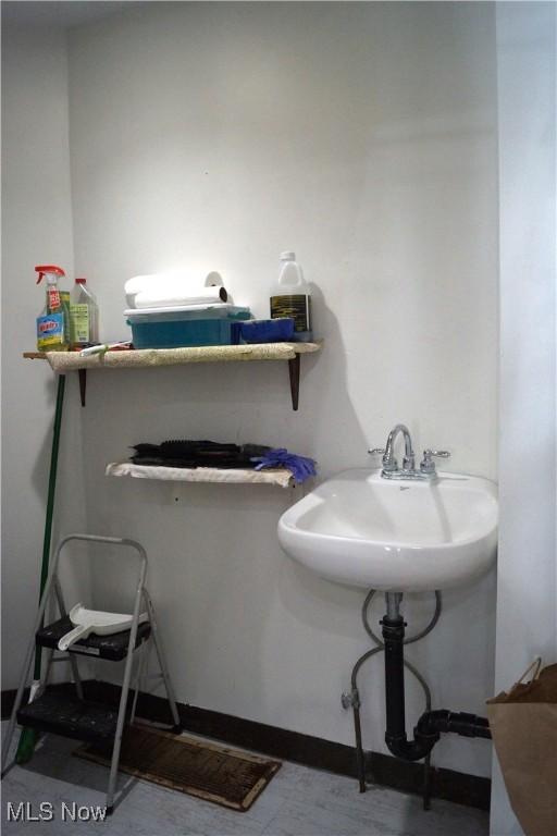 208 2nd St SW, Carrollton, OH 44615 - bathroom featuring a sink