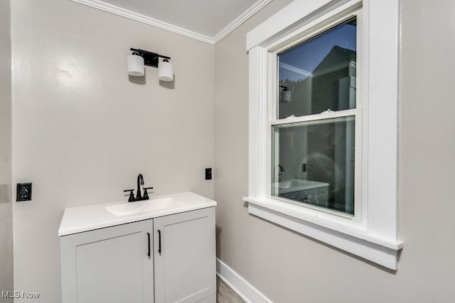2819 4th St NW, Canton, OH 44708 - bathroom with crown molding and vanity