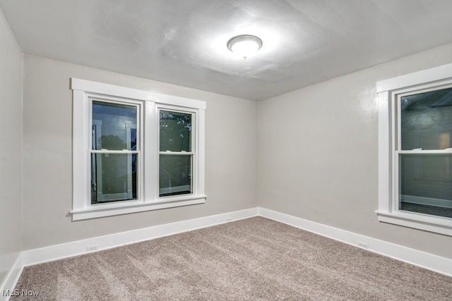 2819 4th St NW, Canton, OH 44708 - carpeted empty room with baseboards