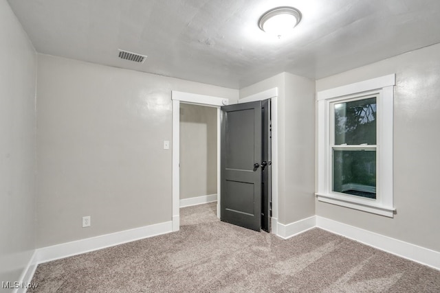 2819 4th St NW, Canton, OH 44708 - carpeted empty room with baseboards