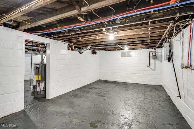 2819 4th St NW, Canton, OH 44708 - unfinished basement featuring gas water heater and gas meter