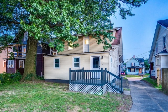 2819 4th St NW, Canton, OH 44708 - rear view of house featuring a yard