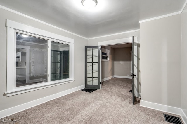 2819 4th St NW, Canton, OH 44708 - carpeted spare room with french doors and ornamental molding