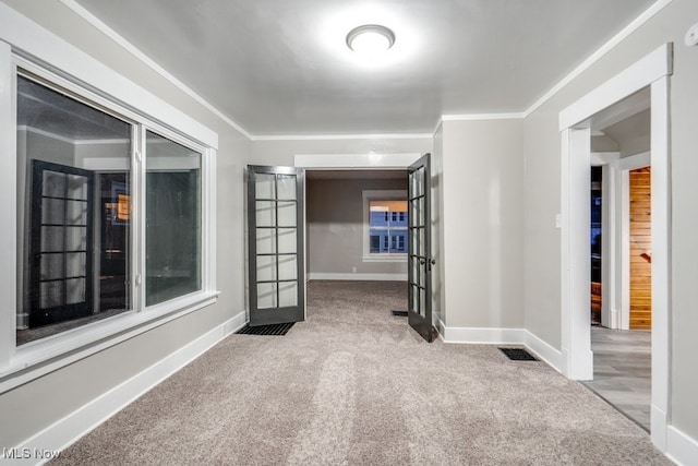 2819 4th St NW, Canton, OH 44708 - carpeted empty room with french doors and ornamental molding