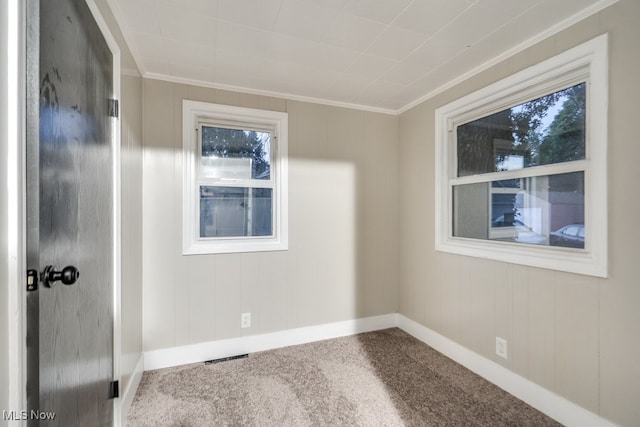 2819 4th St NW, Canton, OH 44708 - unfurnished room with crown molding and carpet flooring