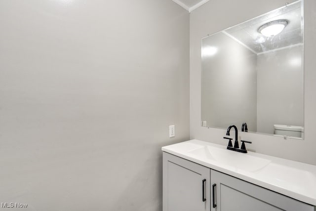 2819 4th St NW, Canton, OH 44708 - bathroom featuring vanity and crown molding