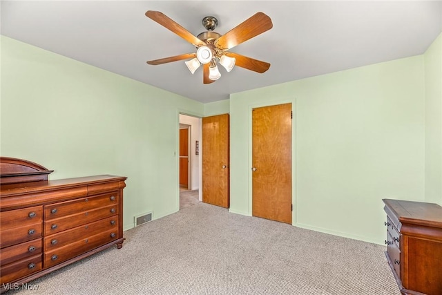 2330 Parkway Blvd, Alliance, OH 44601 - bedroom with carpet flooring, a ceiling fan, and a closet