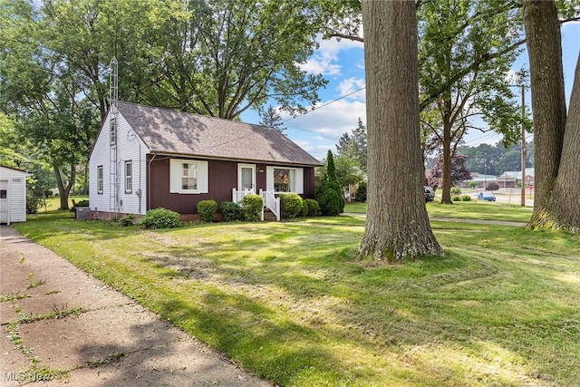2330 Parkway Blvd, Alliance, OH 44601 - view of front facade with a front lawn and roof with shingles