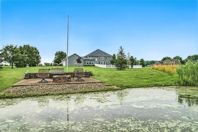 6388 Brianna Way NW, Warren, OH 44481 - view of grassy yard with an outdoor fire pit