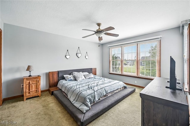 6388 Brianna Way NW, Warren, OH 44481 - bedroom featuring light carpet, ceiling fan, and a textured ceiling