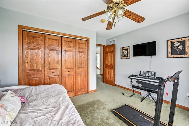 6388 Brianna Way NW, Warren, OH 44481 - carpeted bedroom with a closet and a ceiling fan