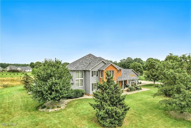 6388 Brianna Way NW, Warren, OH 44481 - view of home's exterior with a yard