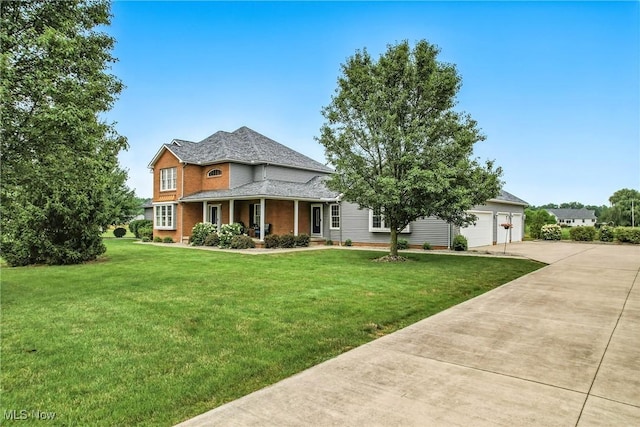6388 Brianna Way NW, Warren, OH 44481 - view of front of house featuring a porch, driveway, a front yard, and a garage