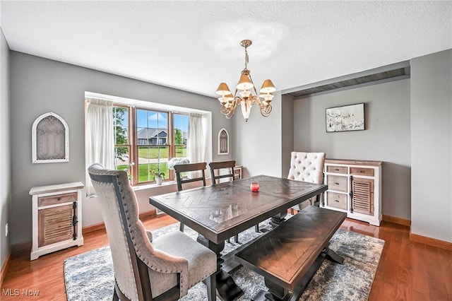6388 Brianna Way NW, Warren, OH 44481 - dining room featuring a chandelier and wood finished floors