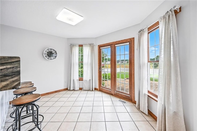 6388 Brianna Way NW, Warren, OH 44481 - doorway to outside featuring baseboards
