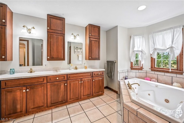 6388 Brianna Way NW, Warren, OH 44481 - bathroom with double vanity, a tub with jets, and tile patterned floors