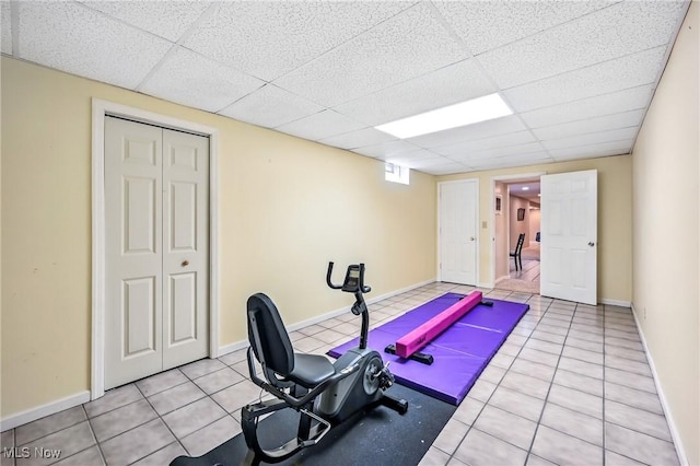 6388 Brianna Way NW, Warren, OH 44481 - workout area featuring a drop ceiling and light tile patterned floors