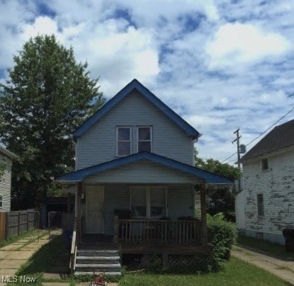 3665 E 103rd St, Cleveland, OH 44105 - american foursquare style home with a porch