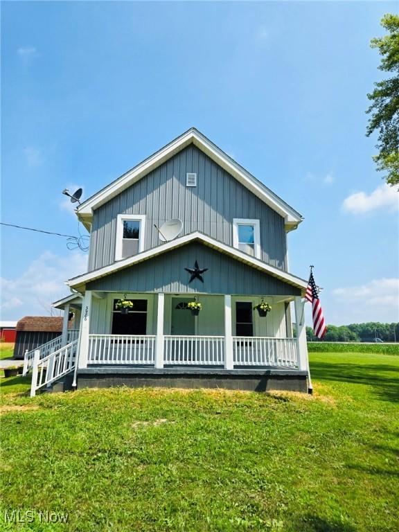 3986 Newton Falls Bailey Rd, Newton Falls, OH 44444 - view of front of home with covered porch and a front yard