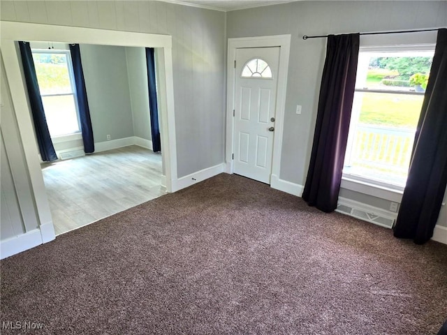 3986 Newton Falls Bailey Rd, Newton Falls, OH 44444 - entrance foyer with carpet floors and crown molding