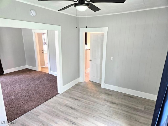 3986 Newton Falls Bailey Rd, Newton Falls, OH 44444 - unfurnished bedroom featuring crown molding, wood finished floors, and ceiling fan