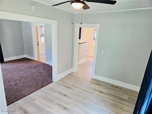 3986 Newton Falls Bailey Rd, Newton Falls, OH 44444 - empty room featuring ceiling fan, ornamental molding, wood finished floors, and a smoke detector