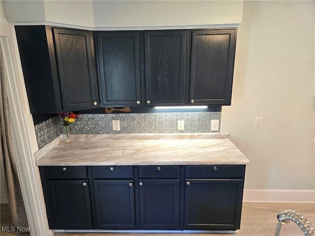 3986 Newton Falls Bailey Rd, Newton Falls, OH 44444 - kitchen with light countertops, wood finished floors, and backsplash