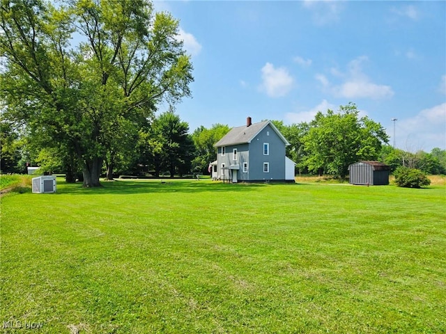 3986 Newton Falls Bailey Rd, Newton Falls, OH 44444 - view of grassy yard with a storage shed