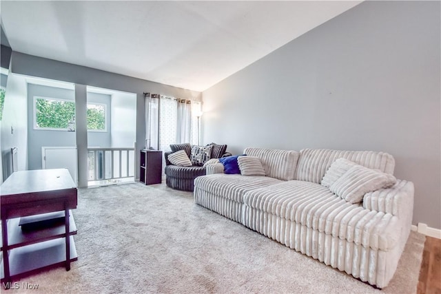 7208 S Galahad Pl, Concord Township, OH 44077 - living area featuring vaulted ceiling and carpet