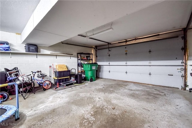 7208 S Galahad Pl, Concord Township, OH 44077 - garage featuring concrete block wall